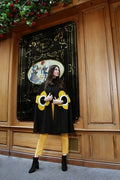 Cape élégante femme noire et jaune